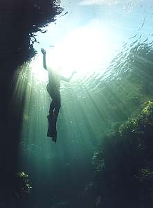 Diver in sun rays