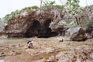 In the distance the Avaiki cave and swimming hole