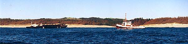 Sand dredge operating at Te Arai Point.